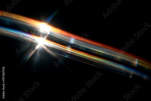 Abstract light streaks on black background, creating a dynamic and energetic visual.