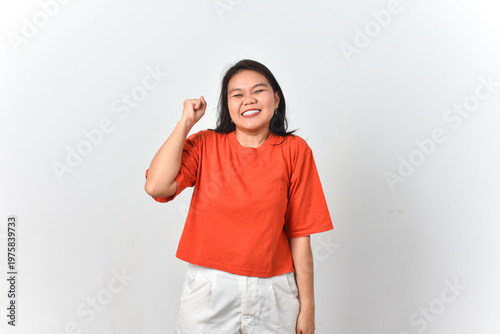 Cuadro en lienzo Happy young woman celebrating victory with a big smile