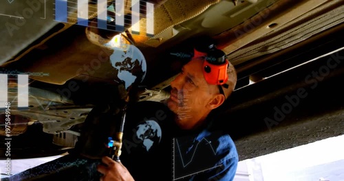 Mechanic lighting torch and heating exhaust, sparks flying, globe chart overlay guiding auto repair