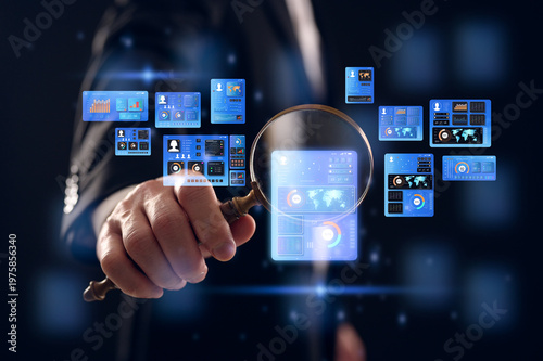 businessman holding magnifying glass looking at virtual data chart dashboard in concept of investment data analysis and DMS document audit financial Tax Fraud audit Using Magnifying Glass