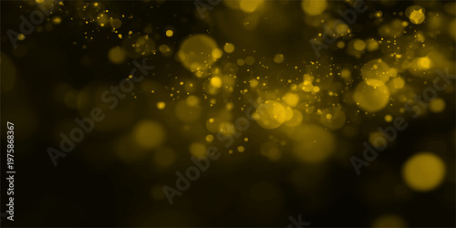 Golden holiday bokeh and sparkling Christmas lights glow through a texture of water drops on a window with a blurred magic shine