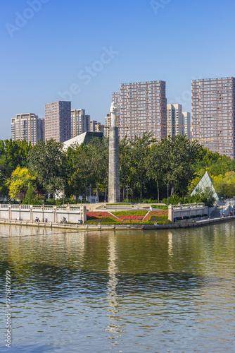 Wallpaper Mural Sculptire on a pillar at the Haihe river in Tianjin, China Torontodigital.ca