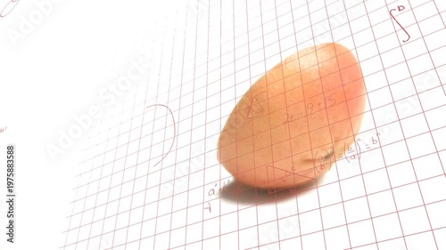 Pink grapefruit wedge rotating and rolling on red grid, camera shifting illustrating math notes