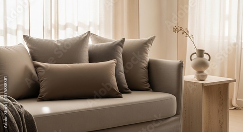 Cozy Living Room Sofa with Decorative Pillows and Minimalist Vase.