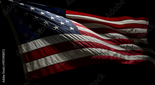 Close up American flag waving in dark dramatic light patriotic background