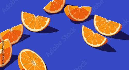 Fresh orange slices scattered across a vivid blue background on a sunlit surface.