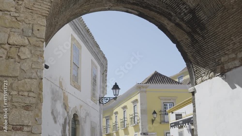 View of the Arco do Repouso, a historic gateway in Faro’s old town.