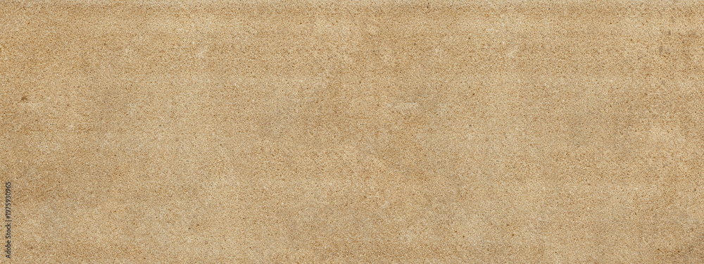 Fototapeta premium Beige textured background showing sand grain surface