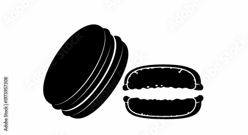 Black and white silhouette of two delicious macarons, one whole and one cut in half, showcasing their sweet filling.