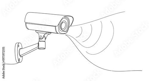 Security camera on a wall bracket.