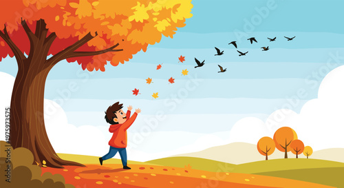 Excited boy runs across an orange autumn field trying to catch falling maple leaves under a large colorful tree.
