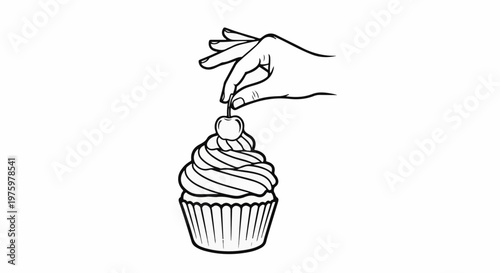 Hand placing cherry on swirling frosted cupcake