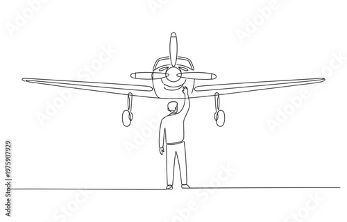 Man reaching for airplane wing with landing gear airplane aviation aircraft transport propeller fuselage aeroplane transportation airliner navigation