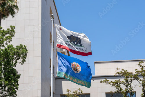 Flag of California and flag of Los Angeles County are shown.  Los Angeles, CA, USA, on July 11, 2022