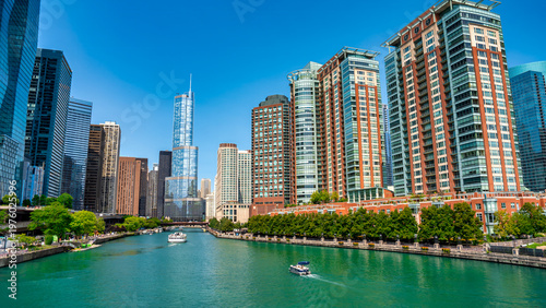 Fotografie Modern skyscrapers along Chicago River on a beautiful summer morning