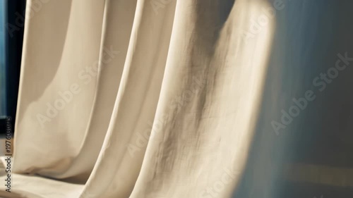 Opening Curtain Revealing Soft Light in Minimalist Room