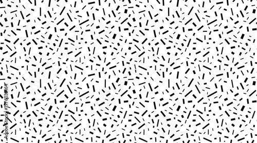 Black and white confetti pieces.