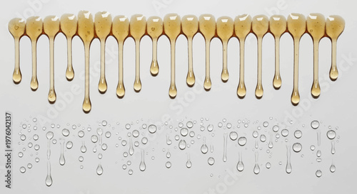 Viscous golden honey and clear water droplets dripping against a white background, showcasing different textures and liquid flow