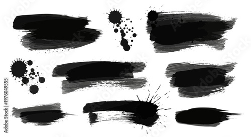 Set of black hand-drawn ink brush strokes, splatters, and paint drips isolated on a white background for design elements.