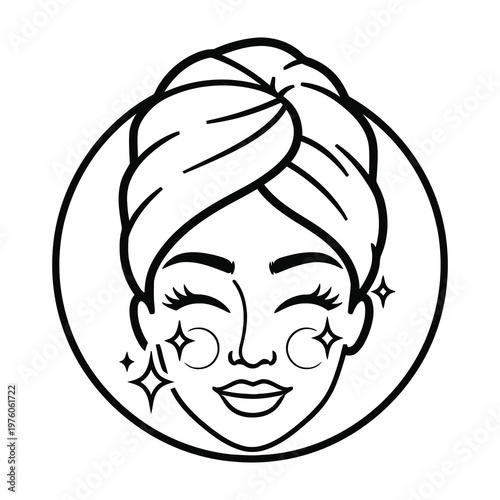 Woman with towel on head and sparkling skin care products