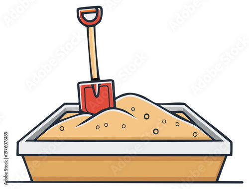 Childrens sandbox with a red shovel embedded in the sand ready for play