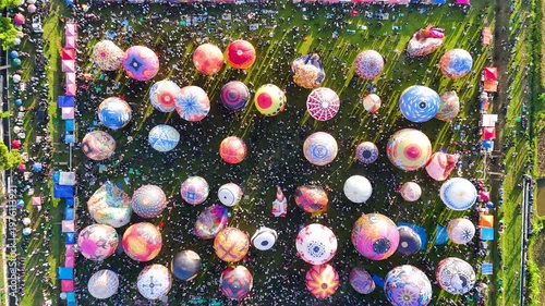Massive Hot Air Balloon Festival Crowd Seen from Above in Open Field