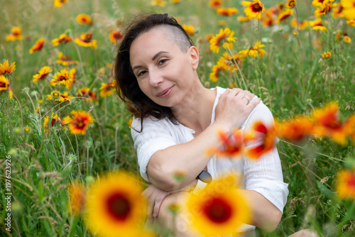 Cheerful Woman in a Field of Sunflowers
