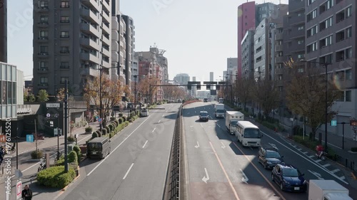Tokyo Scene  :  Urban Beltway Lined With High-Rise Buildings on Both Sides on a Sunny Day  |  Shibuya, Tokyo, Japan