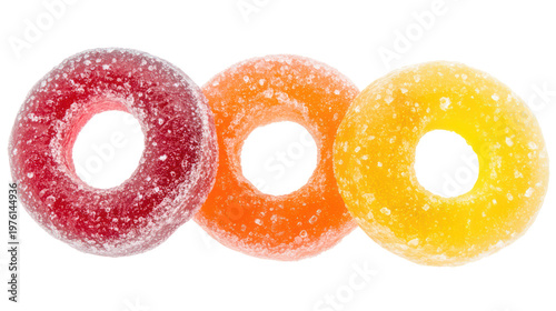 Three colorful sugar-coated candies on transparent background