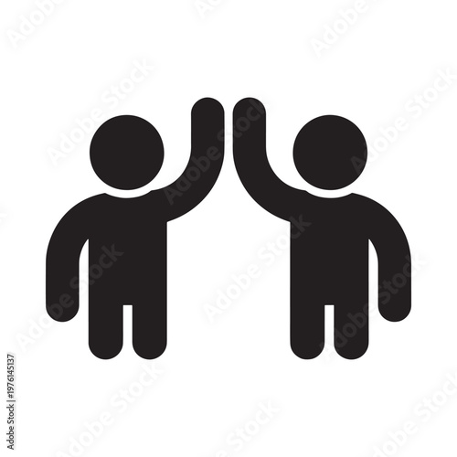 Two silhouetted figures giving each other a high five