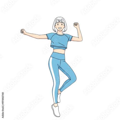 A woman in blue activewear jumping with fists clenched