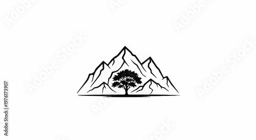 Silhouette of a mature tree centered between jagged mountain peaks