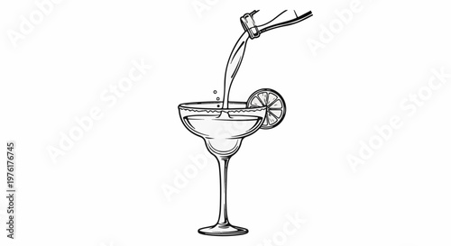 A bottle pours liquid into a stemmed glass with a lime slice garnish