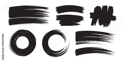 Assortment of black brush strokes circles and abstract shapes isolated on white background for design.