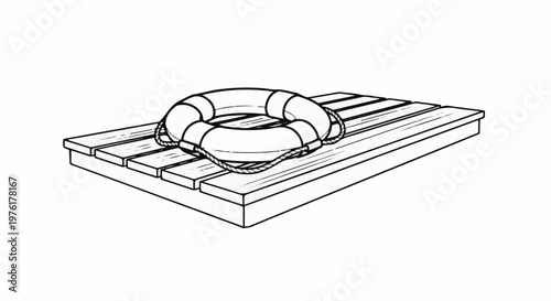 A life preserver rests on a wooden dock, ready for use near water