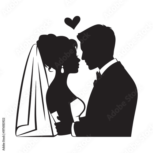 Silhouette of a bride and groom sharing a tender moment during their wedding