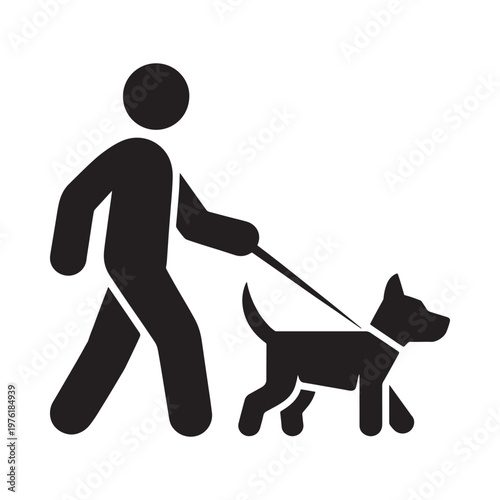 Silhouette of a person walking a dog on a leash outdoors