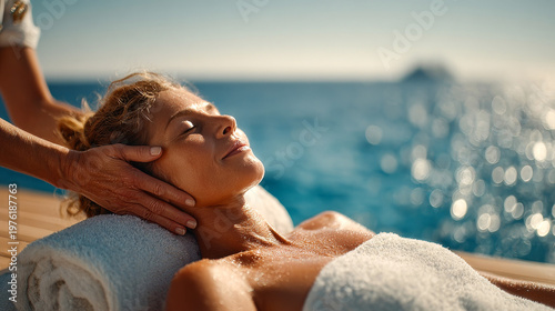 Mature woman receiving a relaxing face massage at a luxury outdoor spa by the sea for an indulgent wellness story or peaceful summer vacation tale of self care