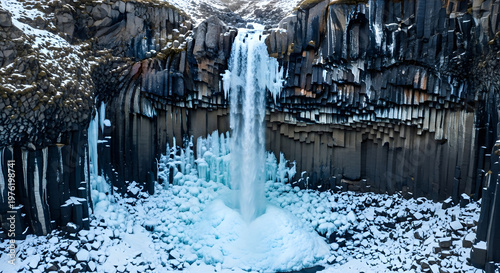 Frozen waterfall in iceland a stunning winter landscape of ice and stone