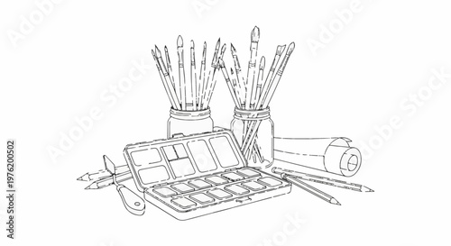 An artist's toolkit paints, brushes, pencils, and rolled paper