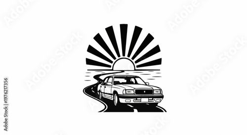 Car driving on a winding road towards a rising sun over water