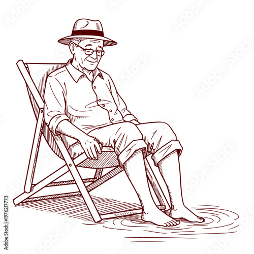 Elderly man relaxing in deck chair with feet in water  