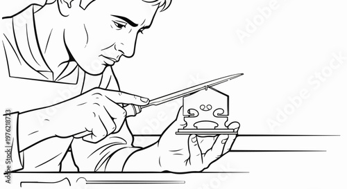 Craftsman carefully files a violin bridge