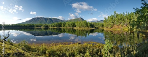 Russia, Western Buryatia. Early morning on the deserted taiga lake Guzen-Nur, hidden from prying eyes, on the left bank of the Tisa River.