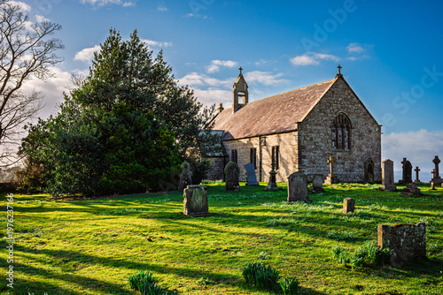 Graveyard of St Oswald's Church, Heavenfield,s a historic hilltop chapel in Northumberland, situated along Hadrian's Wall Path, at the spot where King Oswald is said to have raised a wooden cross 