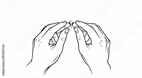 Hands breaking a cigarette in two