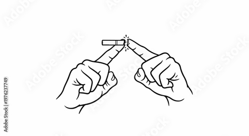 Hands breaking a cigarette in half with a determined grip