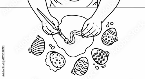 Hands painting decorative Easter eggs with a brush and paint