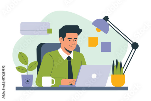 A man in a green sweater works on his laptop at a desk with a lamp and plants