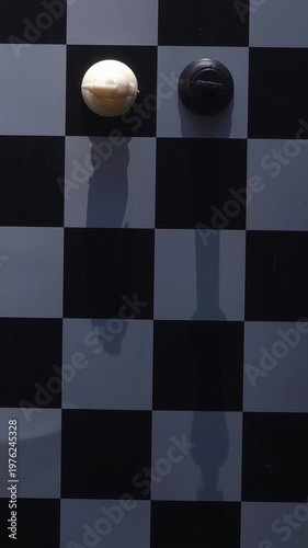 Cinematic pan over a messy chessboard of fallen pieces